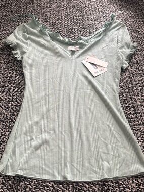 George Mint Ribbed V‑Neck Short Sleeve Top with Ruffle Trim